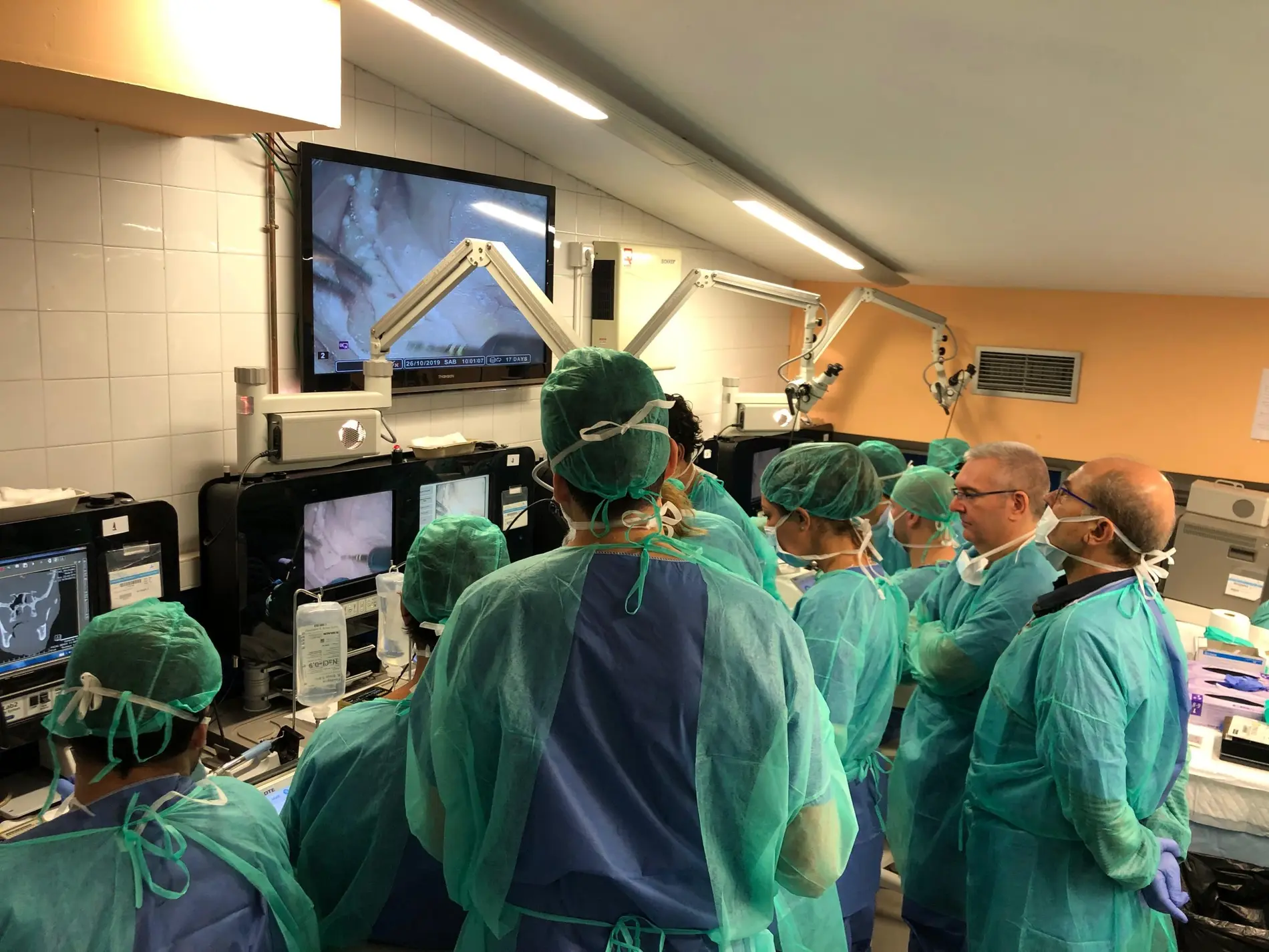 The Hands-On Human Cadaver Training day, with the faculty and the participants around the tables